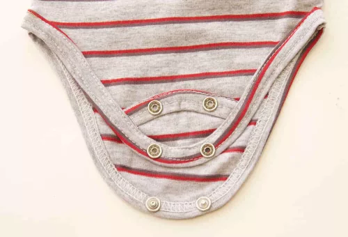 Rövid ujjú dupla patentos " Baby Boss" feliratú baba body