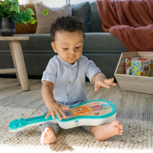 BABY EINSTEIN Játék Musical Fa Ukulele Magic Touch HAPE 6hó+