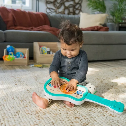 BABY EINSTEIN Játék Musical Fa Ukulele Magic Touch HAPE 6hó+