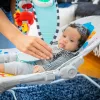 BABY EINSTEIN Zenélő rezgő pihenőszék Kick to It Opus 18kg-ig