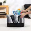 BABY EINSTEIN Puha könyv rágókával és textúrákkal Shades of the Sea™, 0m+