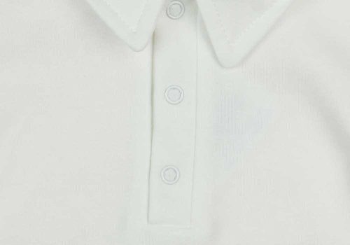 Egyszínű, elöl patentos, gallétos hosszú ujjú baba body-kombidressz.