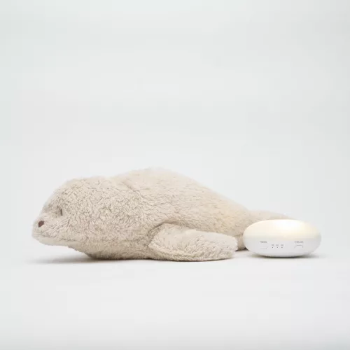 Moonie 2.0 the Organic Humming Seal - dallammal és lámpával, alvástámogató éjjeli fény, fóka  - sand